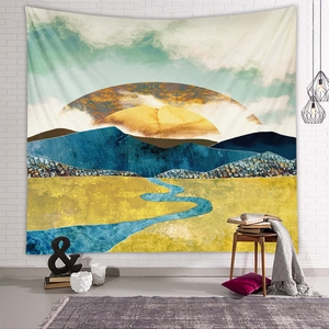 Detail of artistic mountain landscape tapestry featuring gold sun and flowing blue river