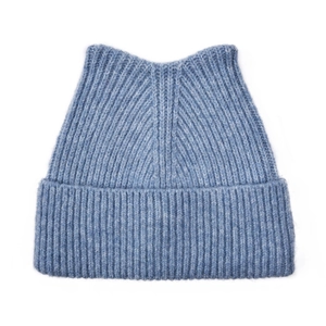 Detailed close-up of light blue cat ear beanie showing thick ribbed knitting texture