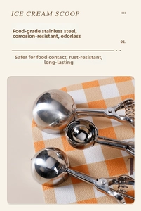 Close-up of food-grade stainless steel ice cream scoop with spring trigger mechanism