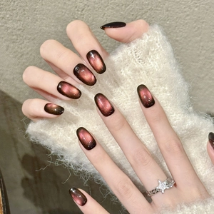 Reddish brown gradient cat-eye press-on nails with shimmering long oval shape