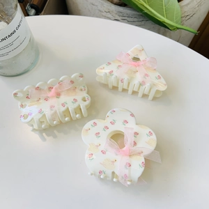 Floral acrylic hair claws with pink rose patterns and cute decorative ribbons