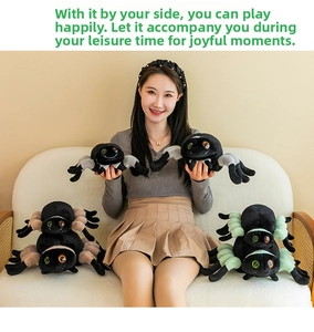 Plush spider toys in multiple sizes shown with model on sofa for home decoration