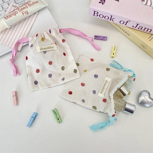 Pastel polka dot drawstring storage bags made of cotton linen for small items