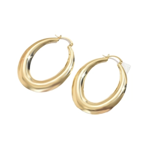 Boucles d'oreilles créoles dorées en U avec un design géométrique minimaliste en goutte