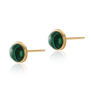 Detailed macro shot of gold irregular round malachite earrings with polished reflection