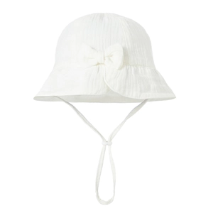Close-up of white cotton baby sun hat featuring soft crinkle fabric and bow detail