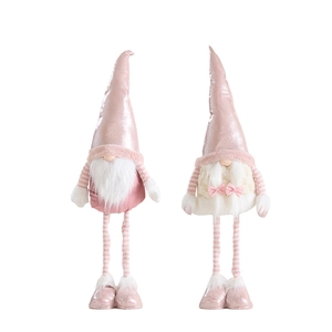Pink and white plush Christmas gnomes with telescopic legs for festive window decoration