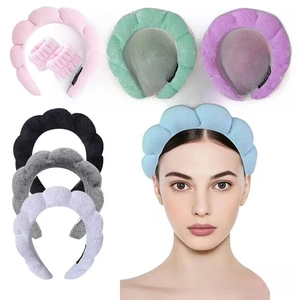 Microfiber spa headband and wristband set in various colors including pink and purple
