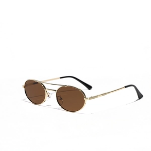 Retro oval sunglasses with gold metal double bridge and gradient lenses in a 45-degree view
