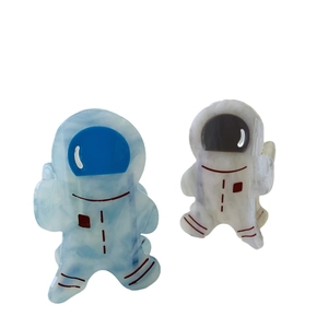 Cute astronaut acetate hair claws in blue and white marble patterns for women