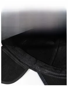 Detail view of the wide sweatband inside the warm winter baseball cap for elderly