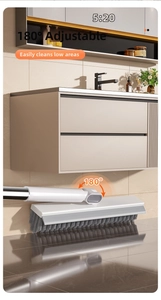 Detail of 180-degree rotating floor brush head cleaning gaps under bathroom furniture
