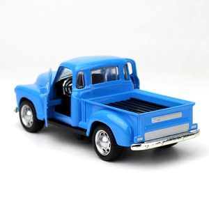Blue vintage alloy pickup model with openable doors and chrome wheel hub details