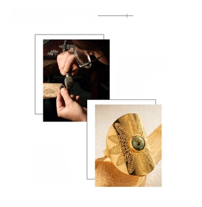 Detail of 18K gold plated vintage ring with turquoise stone and ornate carvings