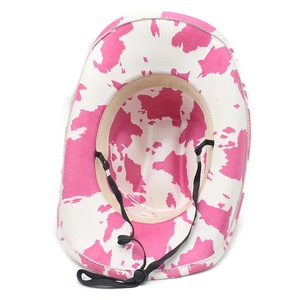 Detail of pink cow print cowboy hat showing soft suede fabric and adjustable black drawstring