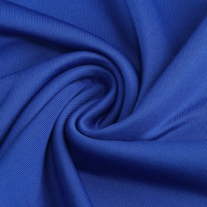 Detailed view of dark blue ribbed knit fabric with soft texture and elastic stripes