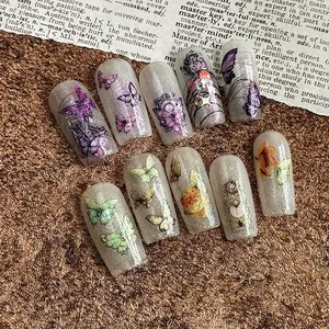 Japanese butterfly and floral nail stickers with glitter on translucent grey base