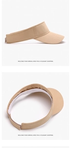 Detail of beige sun visor showing the adjustable velcro strap and inner sweatband