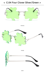Multiple views of silver clover-shaped rimless party sunglasses with green lenses