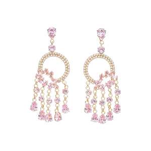 French palace style earrings with pink teardrop gemstones and golden tassels on white