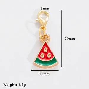 Detailed macro view of a 29mm alloy watermelon slice charm with size measurements
