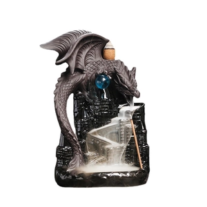 Deep gray dragon on black castle backflow incense burner with blue orb and smoke effect