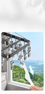 Aluminum sock drying rack with sturdy clips for laundry, hanging in a balcony setting