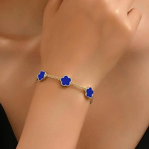 Elegant gold-plated clover bracelet with five blue enamel flowers for a stylish look