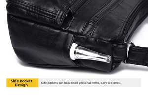Close-up of litchi texture leather side pocket with metal zipper and storage utility