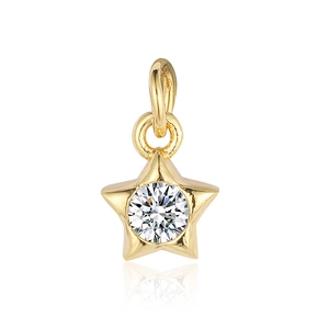Detailed close-up of a gold star pendant with a sparkling central cubic zirconia stone