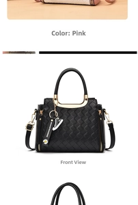Detail of black woven leather tote bag featuring gold hardware and creative daisy charms