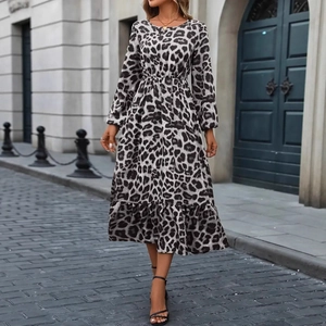 Close-up of leopard print long-sleeve midi dress featuring ruffled hem and elastic waist