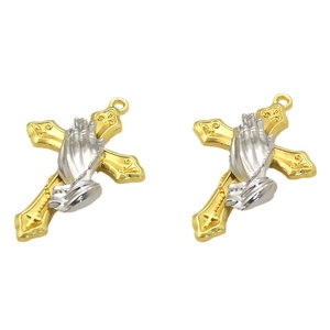 Religious pendant with golden cross and silver praying hands on white background
