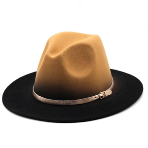 Detail of tan and black gradient fedora hat with a glossy gold buckled leather band