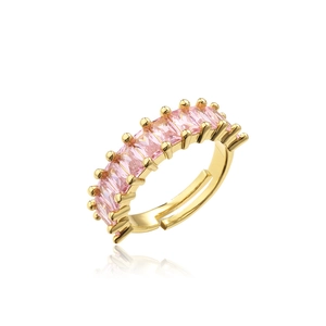 Detail of adjustable gold ring featuring emerald-cut pink cubic zirconia stones
