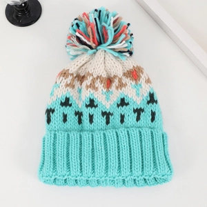 Bohemian jacquard knit beanie with multi-color pompom and mint green pattern