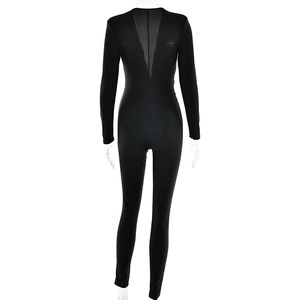Detail view showing the sexy V-shaped sheer mesh back panel on a long sleeve black bodysuit