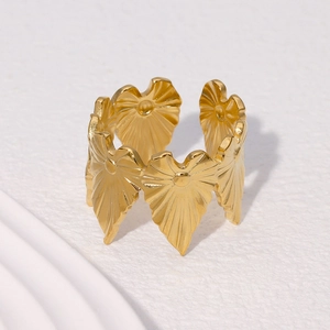 Minimalist gold stainless steel leaf ring with a wide open band and polished finish
