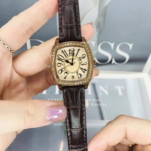 Retro tonneau gold watch with diamonds and brown leather strap for elegant women