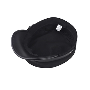 Detail view of the black military hat lining with product label showing material composition