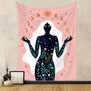 Detail of bohemian tapestry featuring a celestial goddess with lush floral patterns
