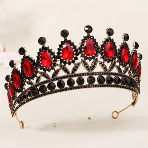 Detailed close-up of retro gothic tiara with large red teardrop crystals and black rhinestones