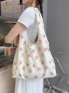 Floral embroidered canvas tote bag for women featuring pink and orange flower patterns