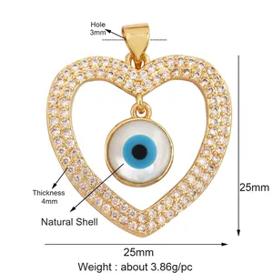 Golden heart pendant with evil eye in natural shell and cubic zirconia border
