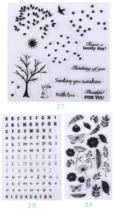 Detailed view of three vintage transparent silicone stamp sets for DIY scrapbooking