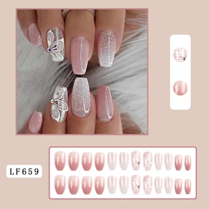 Long coffin fake nails with pink gradient, white butterfly patterns and silver glitter