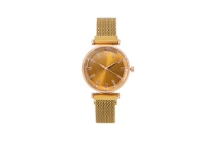 Detail of gold women's quartz watch with roman numerals and metallic mesh strap