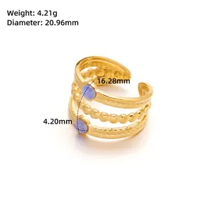 Detail view of gold titanium ring showing 4.21g weight and 16.28mm inner diameter