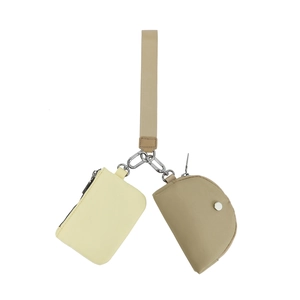 Dettaglio del set di pochette da polso in nylon con cerniera e cinturino intrecciato