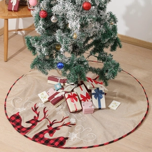 Linen Christmas tree skirt with reindeer pattern and plaid borders for holiday decor
